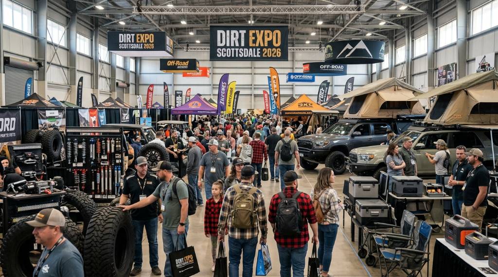 Visitors browsing off-road parts and camping gear booths at DIRT EXPO Scottsdale 2026